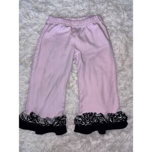 Lolly Wolly Doodle girls sz. 3 pink w/black ruffle bottom design pants. Cute